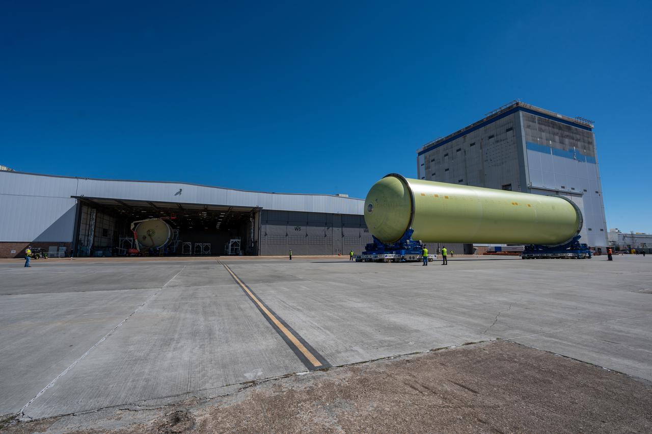 This image highlights the liquid hydrogen tank that will be used on the core stage of NASA’s Space Launch System rocket for Artemis II, the first crewed mission of NASA’s Artemis program. The tank is being built at NASA’s Michoud Assembly Facility in New Orleans. The SLS core stage is made up of five unique elements: the forward skirt, liquid oxygen tank, intertank, liquid hydrogen tank, and the engine section. The liquid hydrogen tank holds 537,000 gallons of liquid hydrogen cooled to minus 423 degrees Fahrenheit and sits between the core stage’s intertank and engine section. The liquid hydrogen hardware, along with the liquid oxygen tank, will provide propellant to the four RS-25 engines at the bottom of the cores stage to produce more than two million pounds of thrust to launch NASA’s Artemis missions to the Moon. Together with its four RS-25 engines, the rocket’s massive 212-foot-tall core stage — the largest stage NASA has ever built — and its twin solid rocket boosters will produce 8.8 million pounds of thrust to send NASA’s Orion spacecraft, astronauts and supplies beyond Earth’s orbit to the Moon and, ultimately, Mars. Offering more payload mass, volume capability and energy to speed missions through space, the SLS rocket, along with NASA’s Gateway in lunar orbit, the human landing system, and Orion spacecraft, is part of NASA’s backbone for deep space exploration and the Artemis lunar program. No other rocket can send astronauts in Orion around the Moon in a single mission.